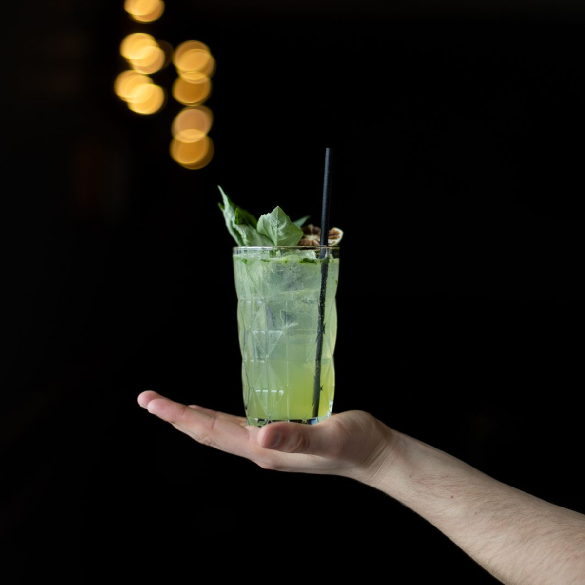 cocktail in hand